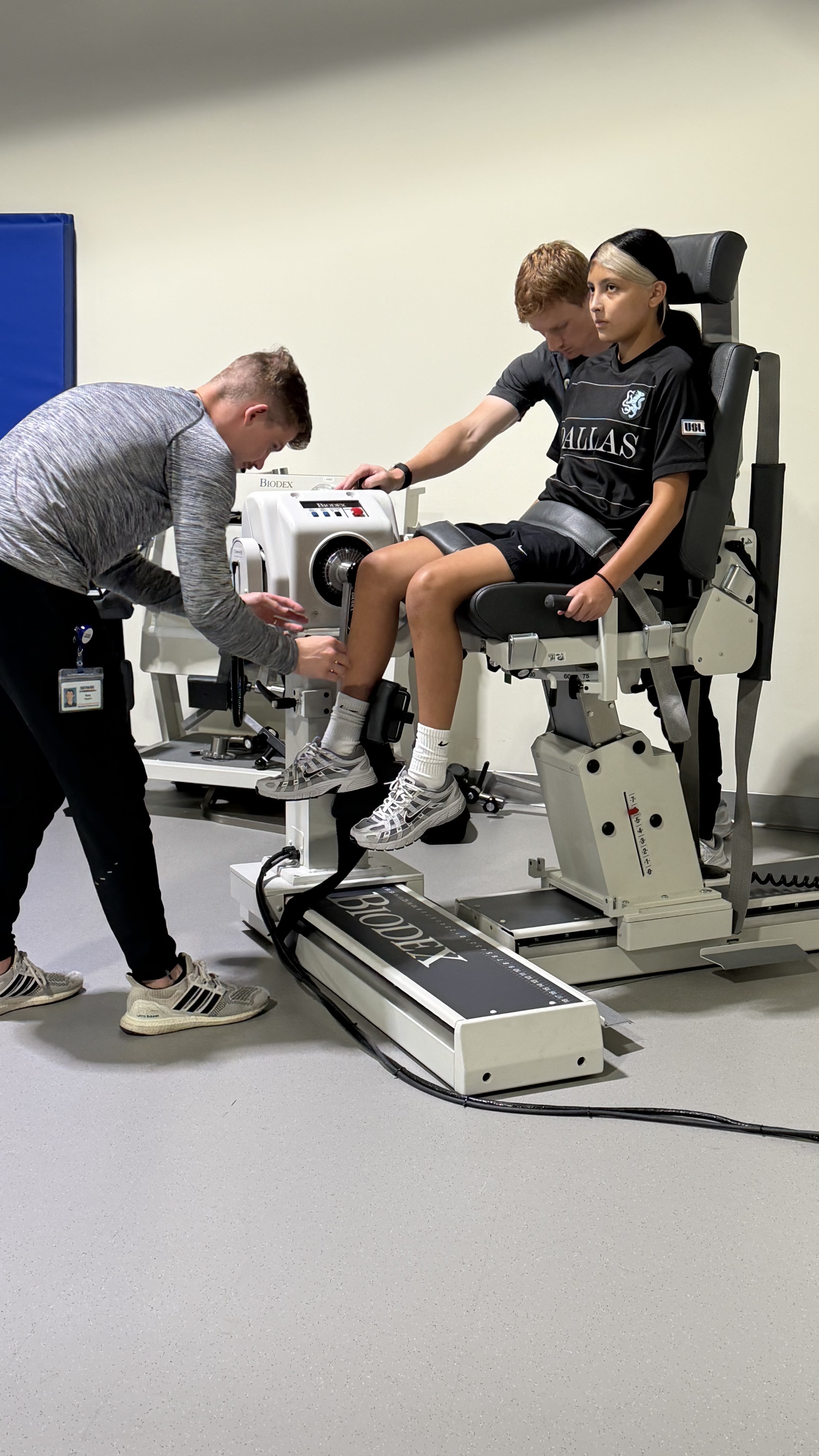 Jaylei completing isokinetic leg strength testing on a Biodex dynamometer